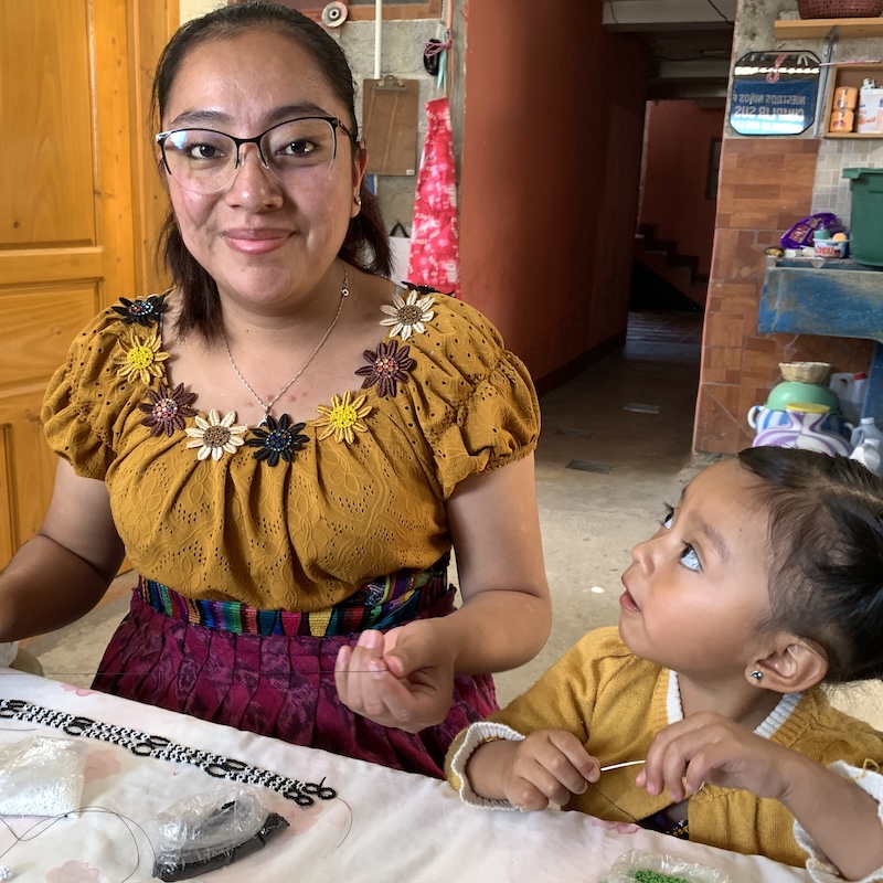 Sewing beads to create eyeglass holders